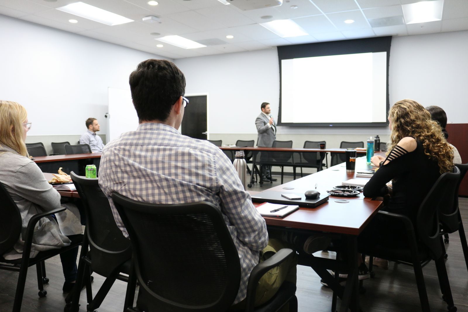 START students and researchers at a lecture
